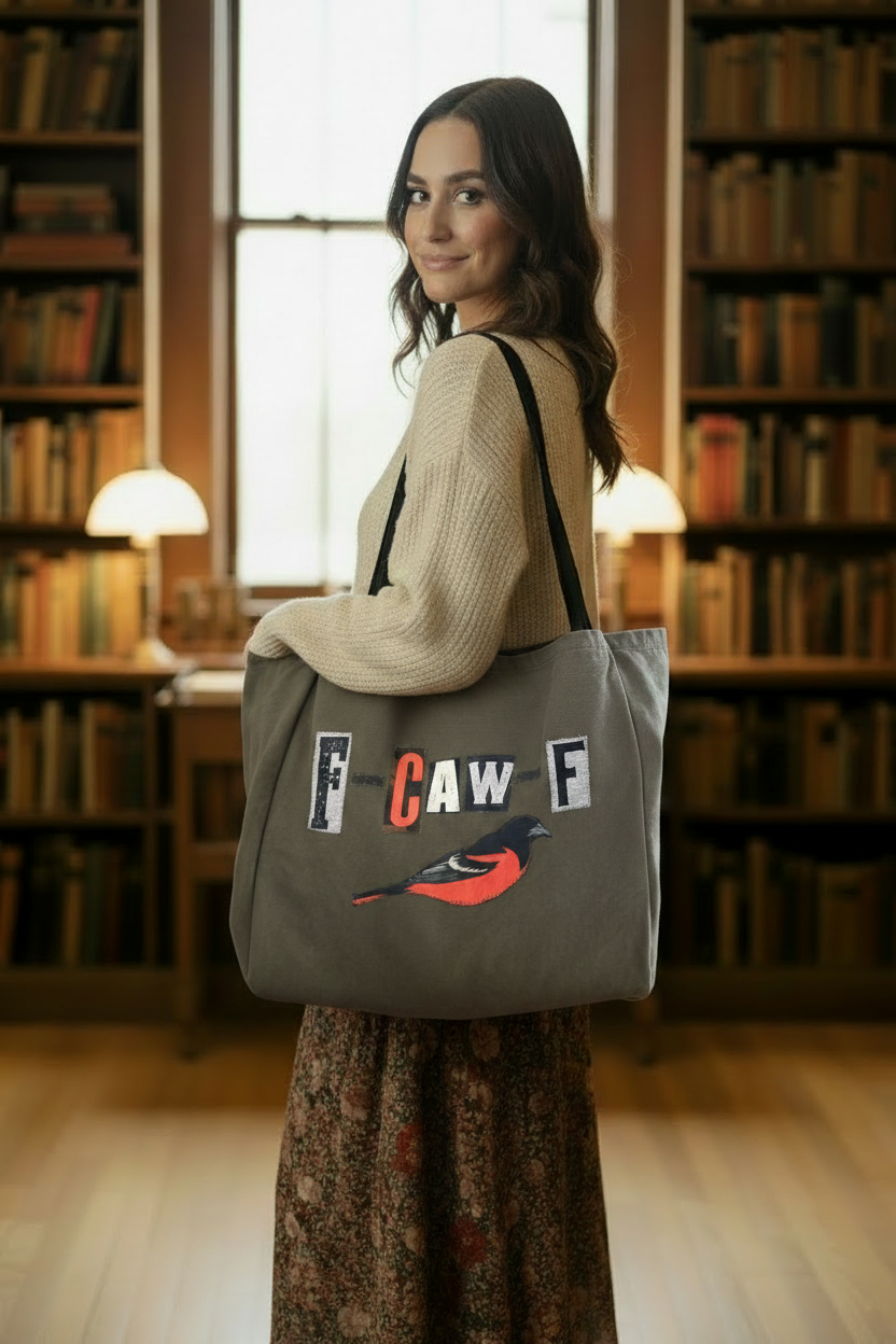 F-CAW-F army green tote bag lifestyle shot — library setting